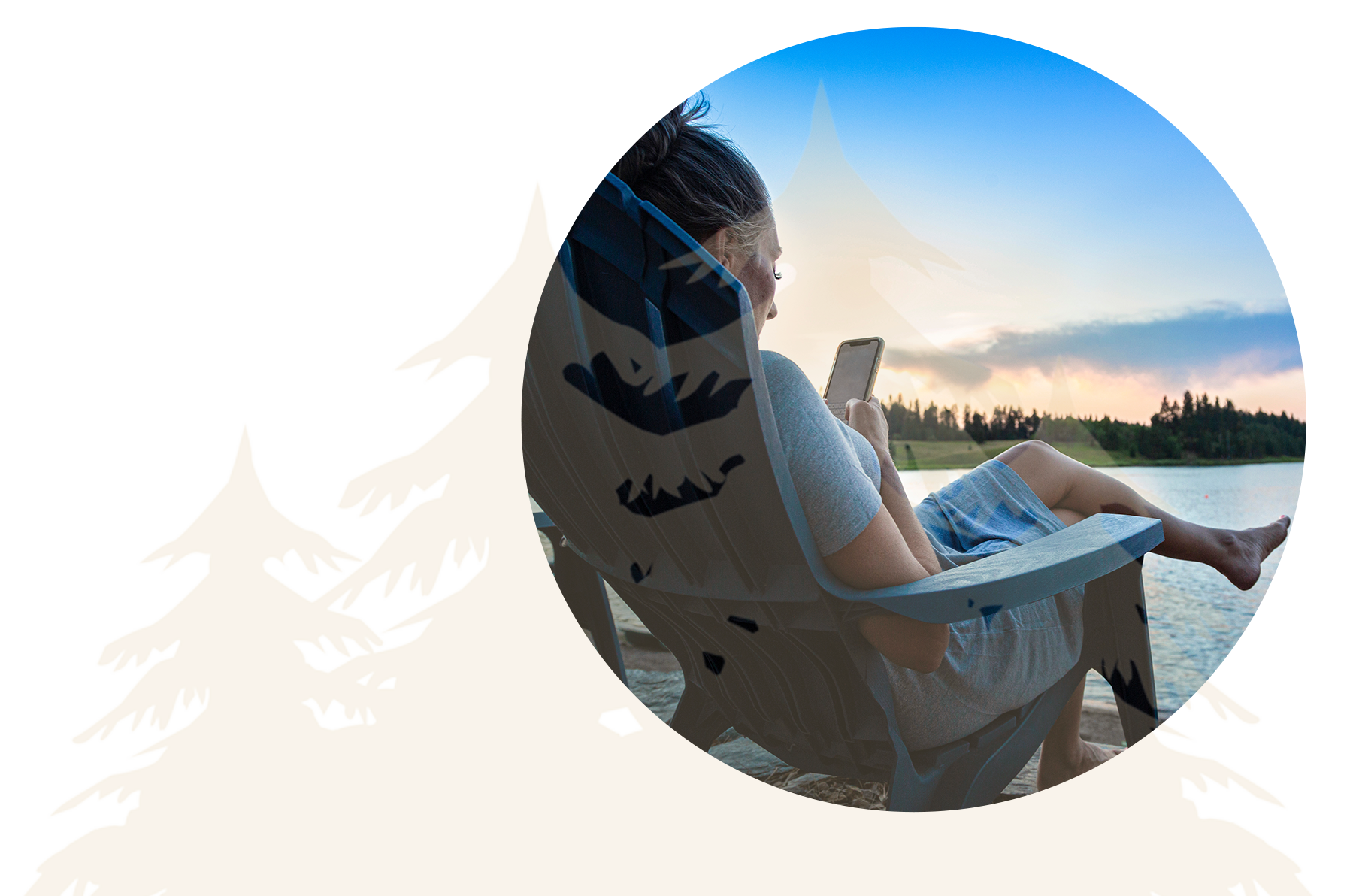 lady on phone relaxing at the lake